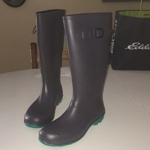 rain boots with blue/green colored bottoms